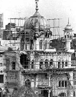 Akal Takht being repaired by the Indian Government after the attack